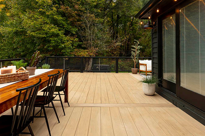 TimberTech-Weathered-Teak-Vintage-Collection-AZEK-Wide-Width-Decking-Expansive-Deck-With-Dining-Home-Content